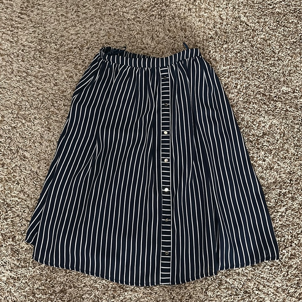 Blue and white striped midi skirt with gold accent buttons